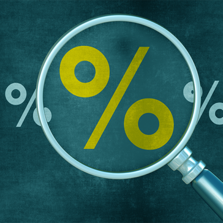 Decorative image: Magnifying glass over a percent sign on green background.