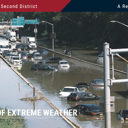 Photo: a New York highway flooded. A highway full of stalled cars with water up to their doors.