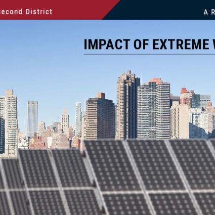 Photo: NY City skyline in background with solar panels in the foreground.