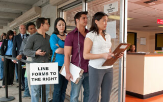 Photo: People standing in line for job & training expo
