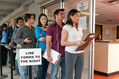 Photo: People standing in line for job & training expo