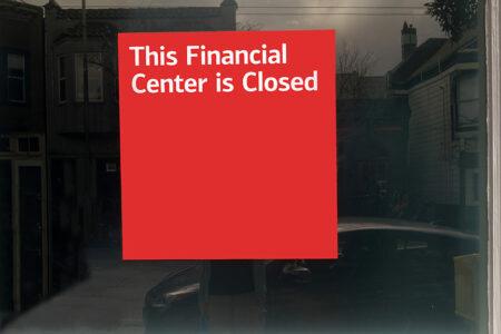 Photo: Red sign with white lettering on window that says: This Financial Center is Closed".