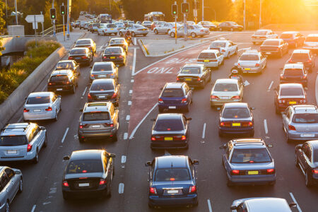 photo of traffic with cars stretching into the distance.