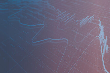decorative photo of line and bar chart over data