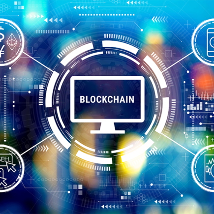 Decorative image: blockchain with spokes including cryptocurrency, mobile $, buy/sell icons. Cryptocurrency fintech theme with big city lights at night.