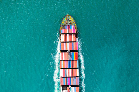Photo: Shipping container in the middle of the ocean.