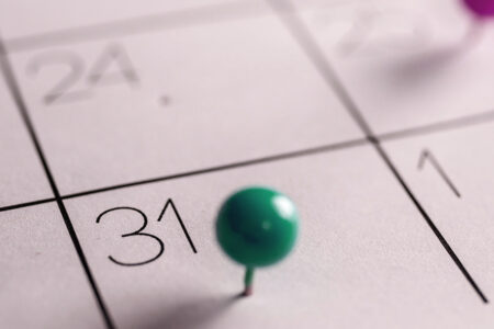 Photo: Partial calendar with a green pin on the 31st.