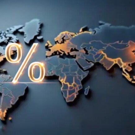 Illustration of a flat world map with a percent sign between north america continent and europe/africa continents. Colored in dark blue and golds.