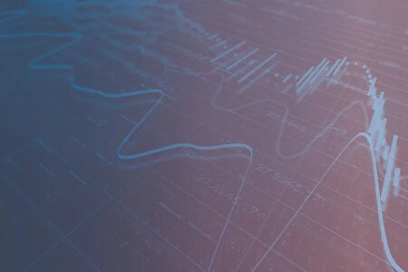 decorative photo of line and bar chart over data